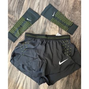 Womens small NEW Nike running shorts with matching arm warmers.